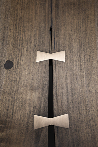 Bronze butterflies or dovetailed keys. Bronze butterflies or dovetailed keys.